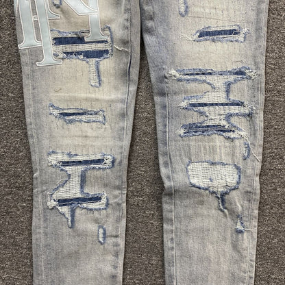 Amiri Jeans Light Blue Torn